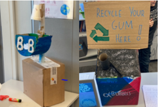 Skoleprosjekt, de har laget noe av esker og pappkopper. Det står "Recycle you gum here". Foto